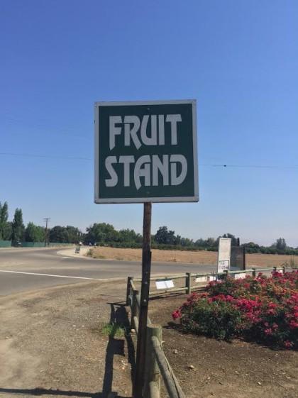 peach fruit stand sign